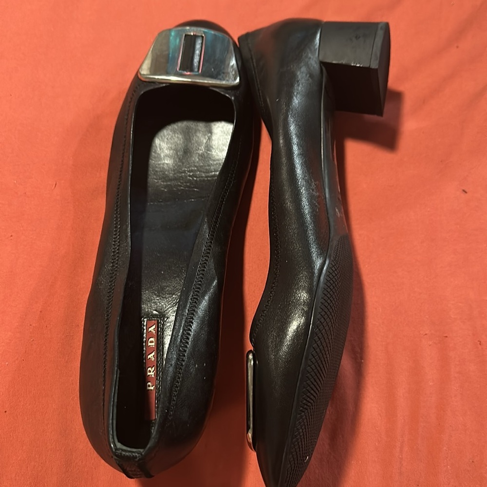 Prada Black and Silver Loafers with small heel with Sleek Design